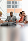 Photo of businesspeople engaged in discussion